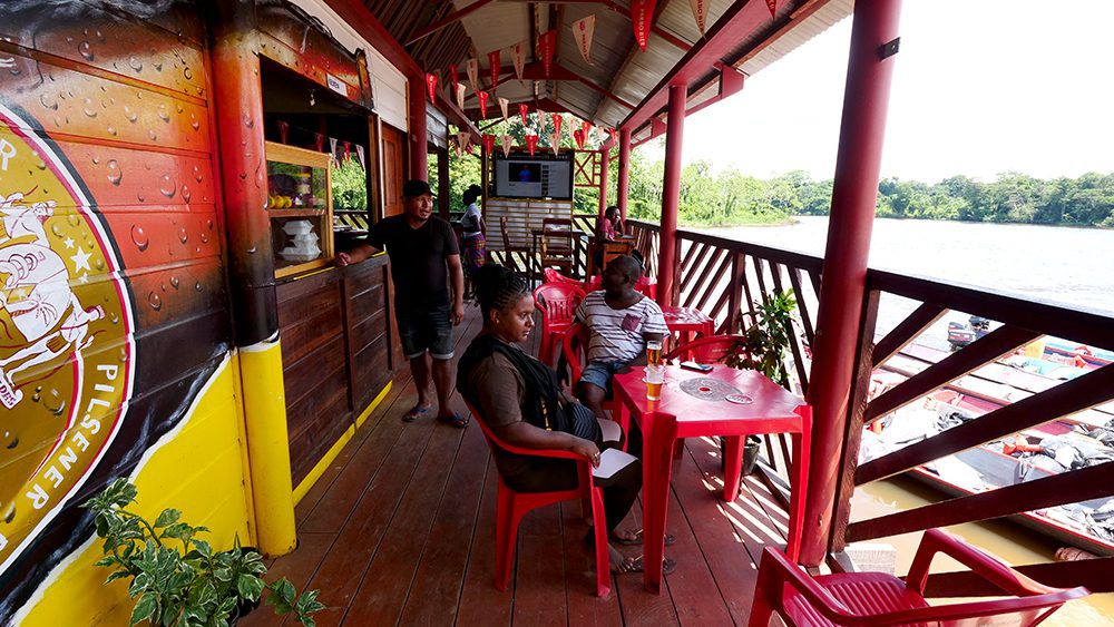 How to get to Miau Espetos Restaurant Suriname in Blauwgrond by Bus or  Ferry?