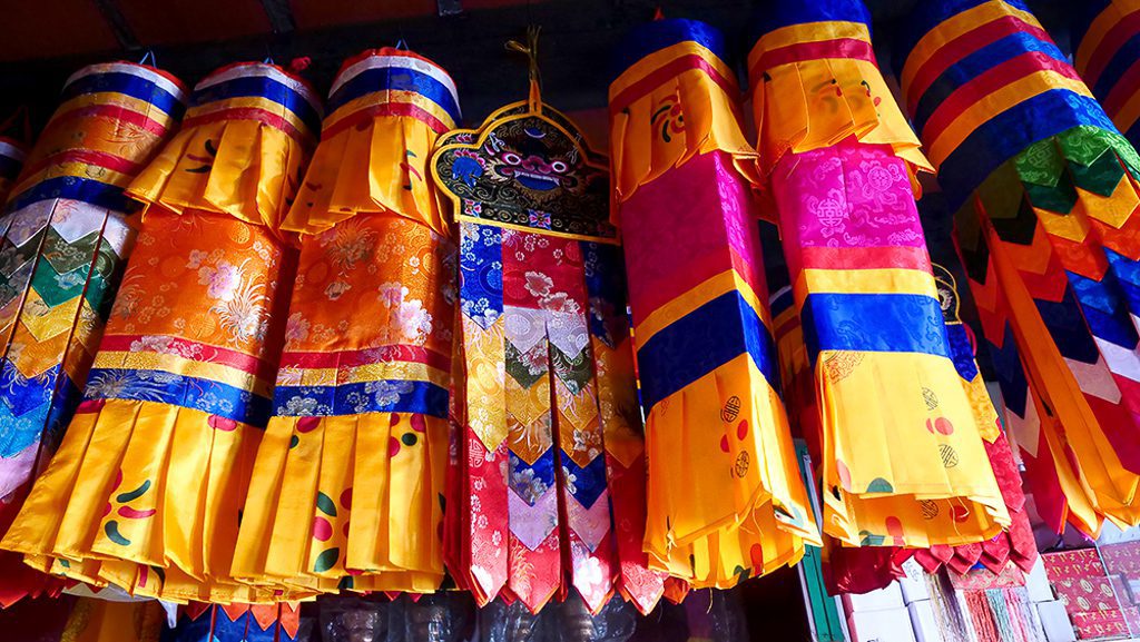 Decorative Buddhist wall hangings in Haa Valley, Bhutan