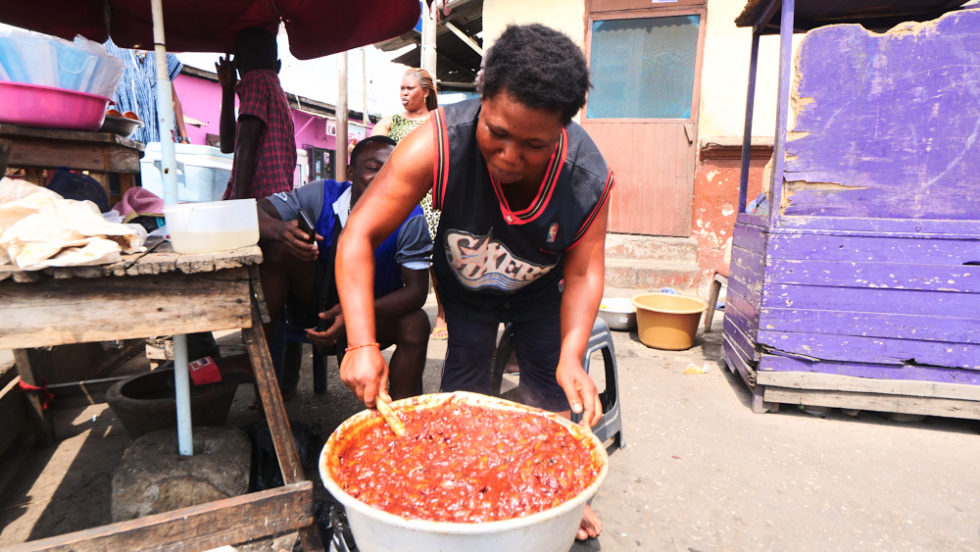 A candy maker on the streets of Accra, Ghana