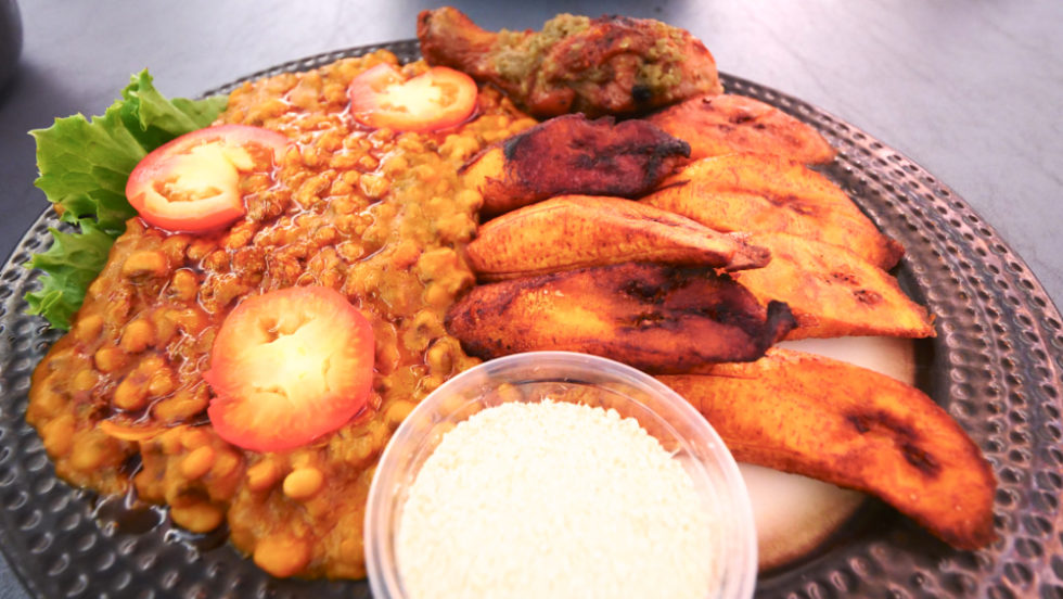 Red red with plantains and chicken in Accra, Ghana