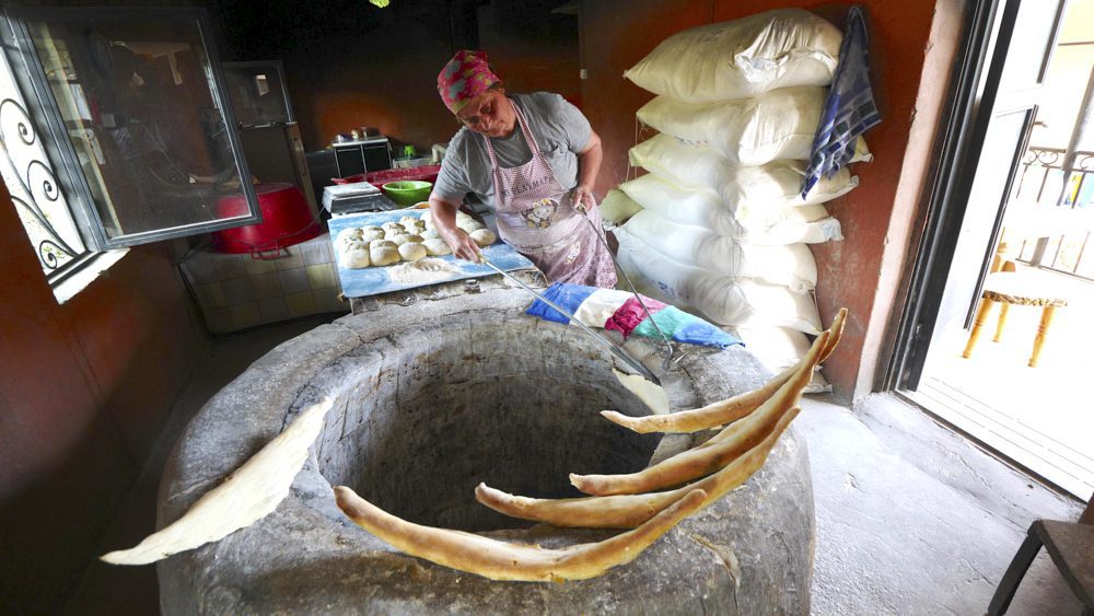A woman making shotis puri in Signagi, Georgia