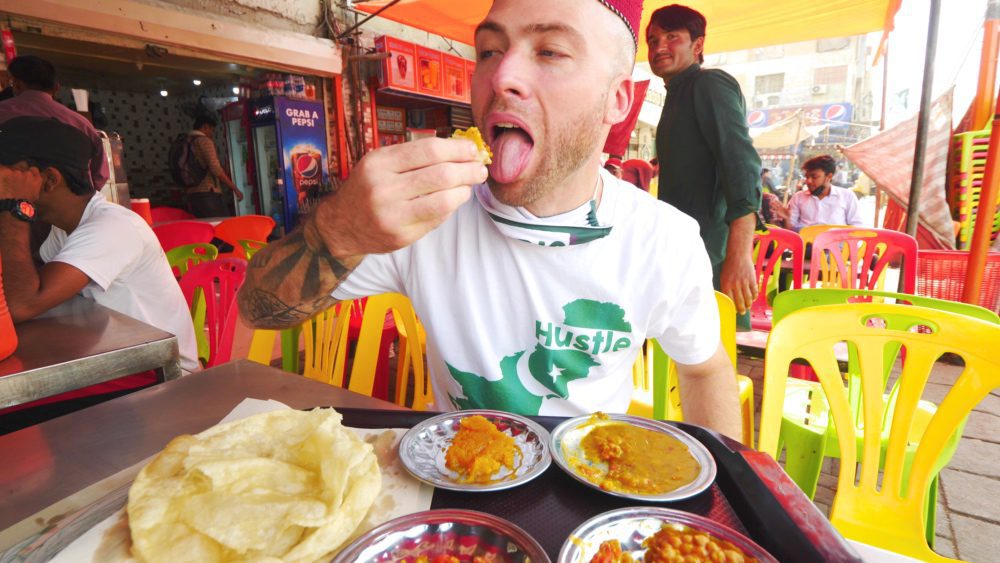 Eating halwa puri in Karachi, Pakistan