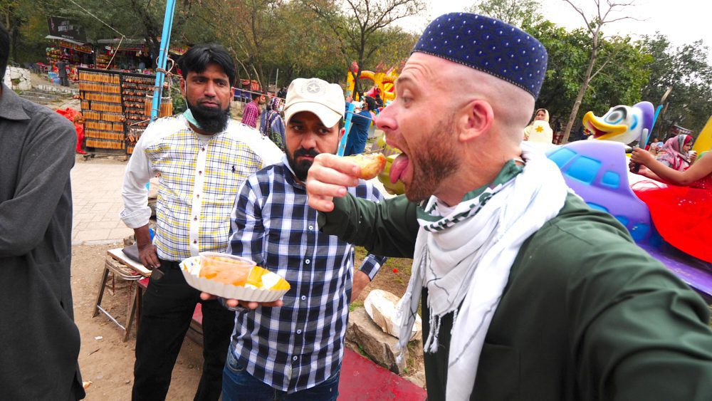 Eating a massive golgappa at Daman-e-Koh near Islamabad, Pakistan