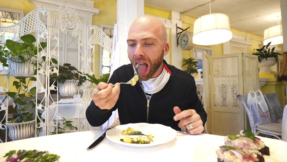 David Hoffmann eating seafood at Dacha Restaurant in Odessa, Ukraine