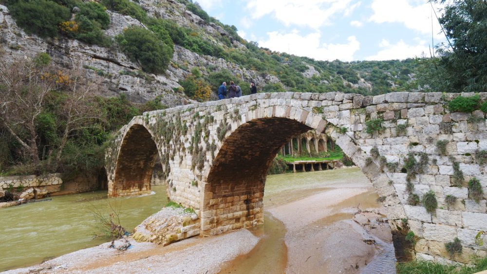 500-year-old Ottoman bridge with an aqueduct in the background