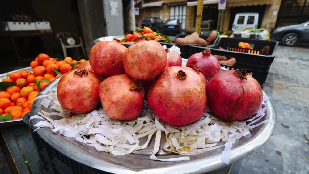 Pomegranates being sold by a street vendor