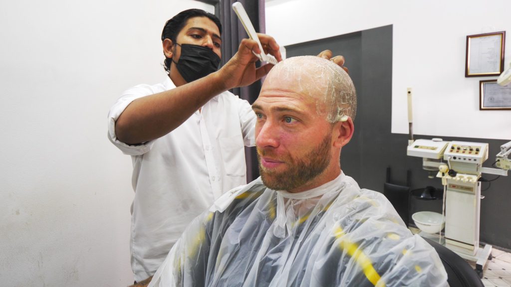 Enjoying a Pakistani haircut experience in Muscat, Oman