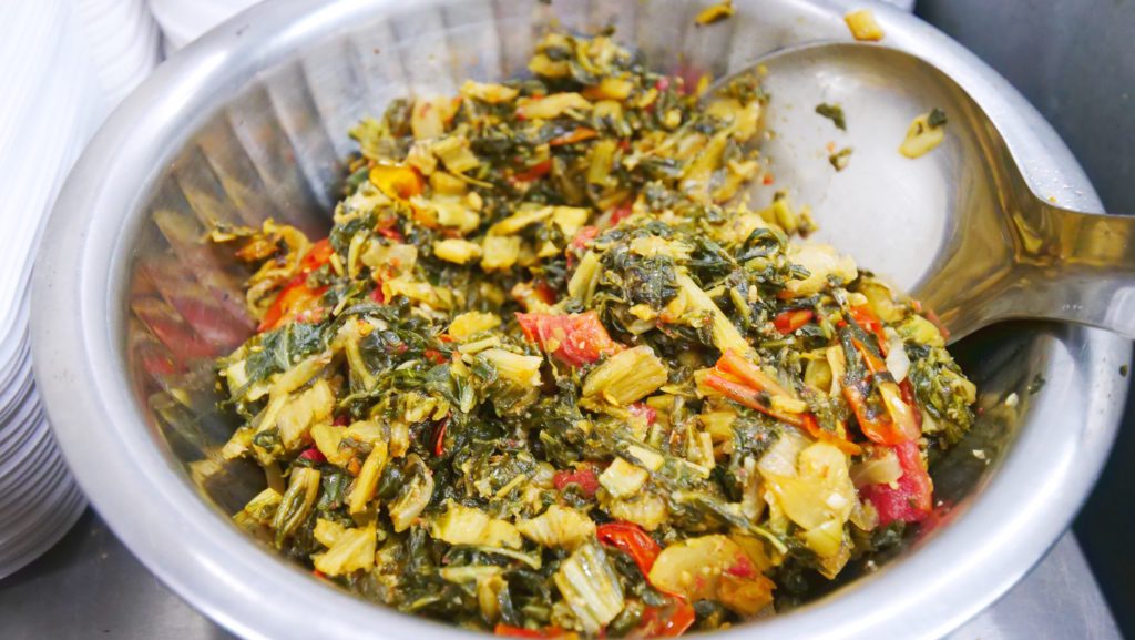 Greens with tomatoes and spices in Port of Spain | David's Been Here