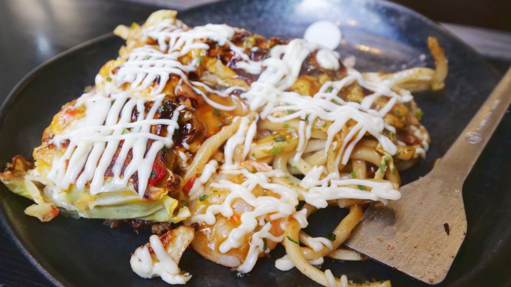 Okonomiyaki is a must-try Japanese food in Japan that's loved by locals and tourists alike | David's Been Here