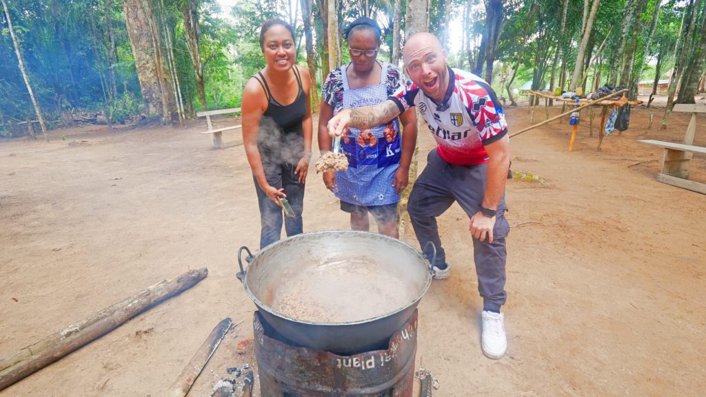 Preparing cook-up rice with locals in the village | Davidsbeenhere 