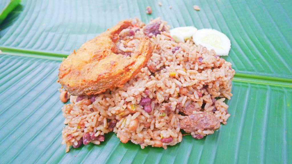 Guyanese cook-up rice with fried trout in Moraikobai, Guyana | Davidsbeenhere