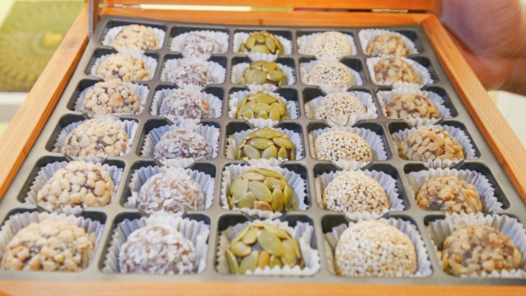 Five varieties of madgooga, an Iraqi sweet made of date balls covered in seeds, nuts, and shredded coconut | Davidsbeenhere