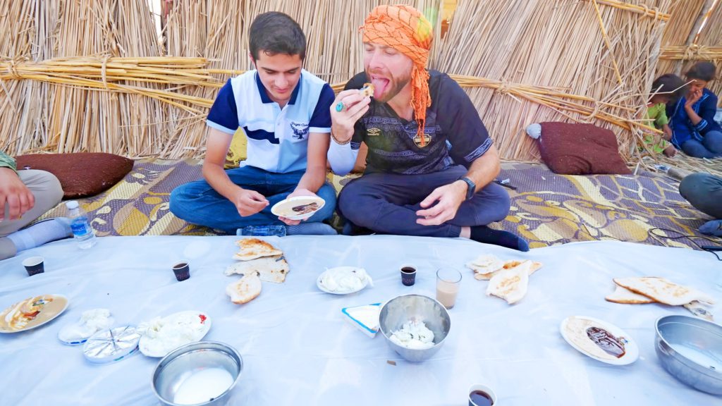 Enjoying an authentic Marsh Arab meal at a grass home in the Iraqi Marshes near Nasiriyah, Iraq | Davidsbeenhere