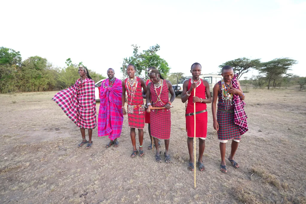 A Sundowner with the Maasai tribe after my evening game drive | Davidsbeenhere