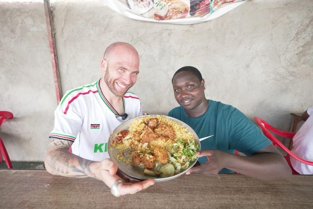 Enjoying Kenyan-Indian biryani with my guide Sam in Mombasa, Kenya | Davidsbeenhere