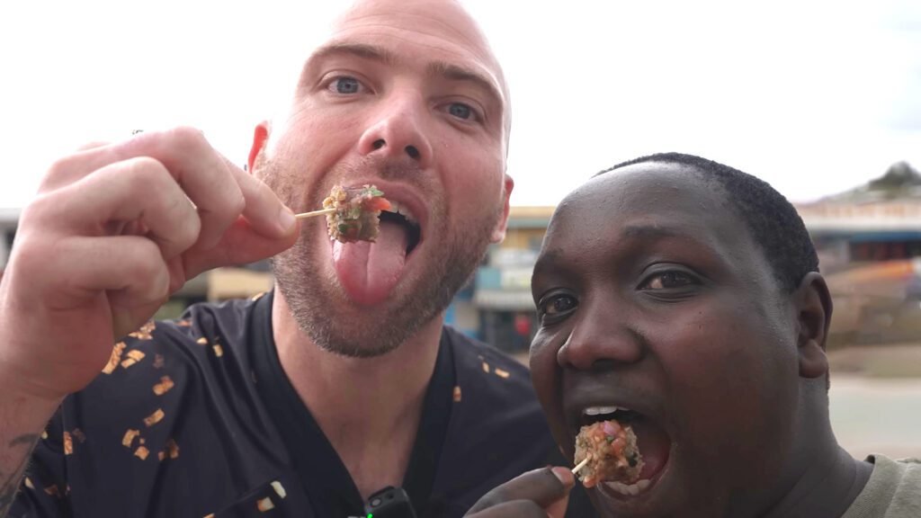 My guide Sam and I eating mutura on the streets of Nairobi | Davidsbeenhere