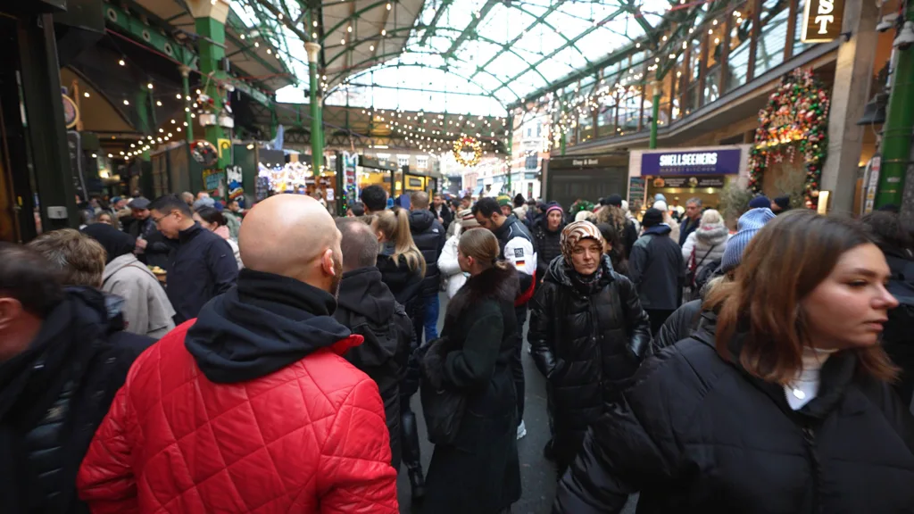 The bustling interior of Borough Market during Christmas time | Davidsbeenhere
