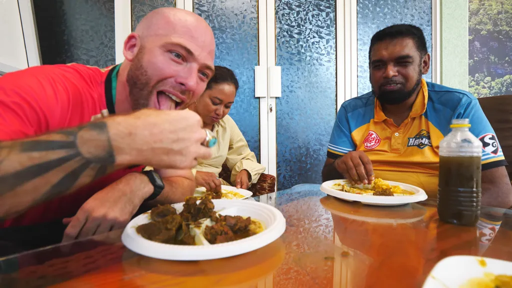 David Hoffmann eats Guyanese beef curry and liver fry with Stacy and President Irfan Ali | Davidsbeenhere