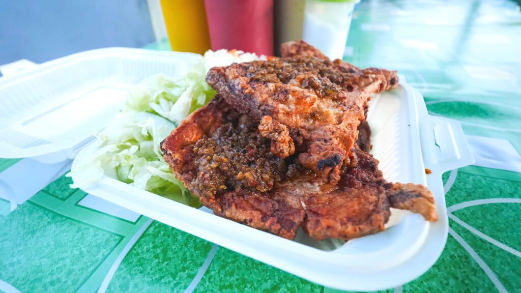 A styrofoam container of fried marlin in Bridgetown, Barbados | Davidsbeenhere
