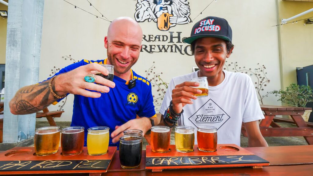 David Hoffmann and his guide Craig enjoy a flight of craft beers at Dreadhop Brewing in Barbados | Davidsbeenhere