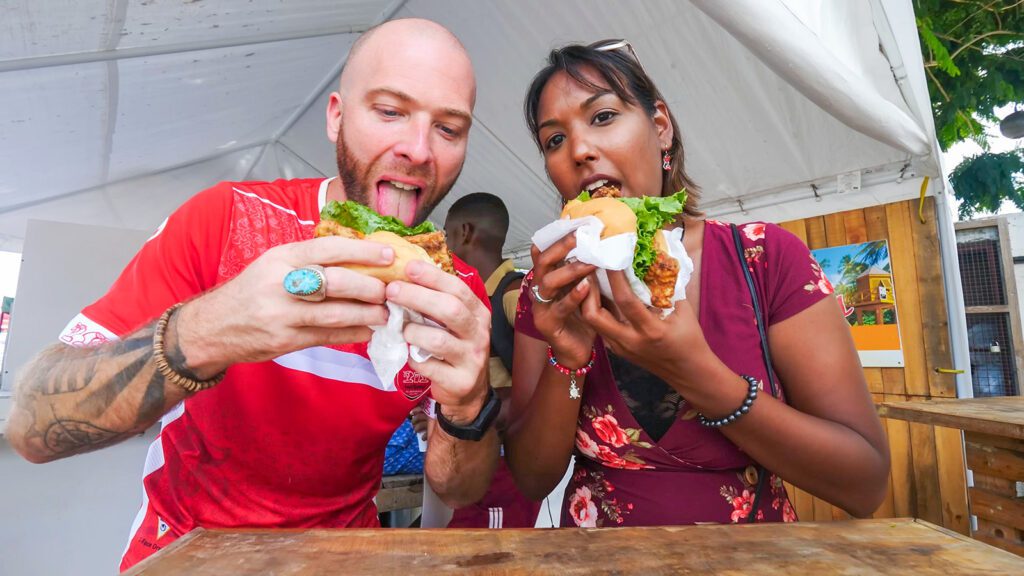 David Hoffmann and his friend Nerissa eating fish cutter sandwiches from Cuzz's Fish Shack on Pebbles Beach | Davidsbeenhere