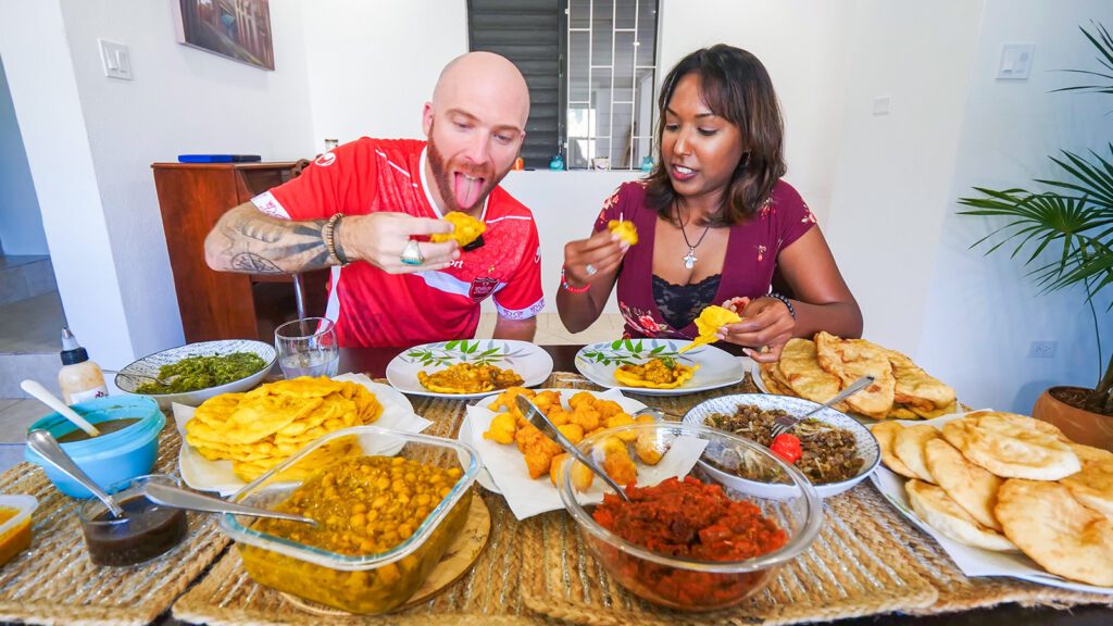 David Hoffmann and his friend Nerissa enjoy an authentic Trini food breakfast in Barbados | Davidsbeenhere
