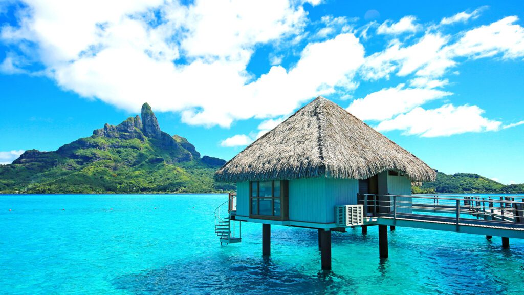 An overwater bungalow in the lagoon on Bora Bora | Davidsbeenhere 