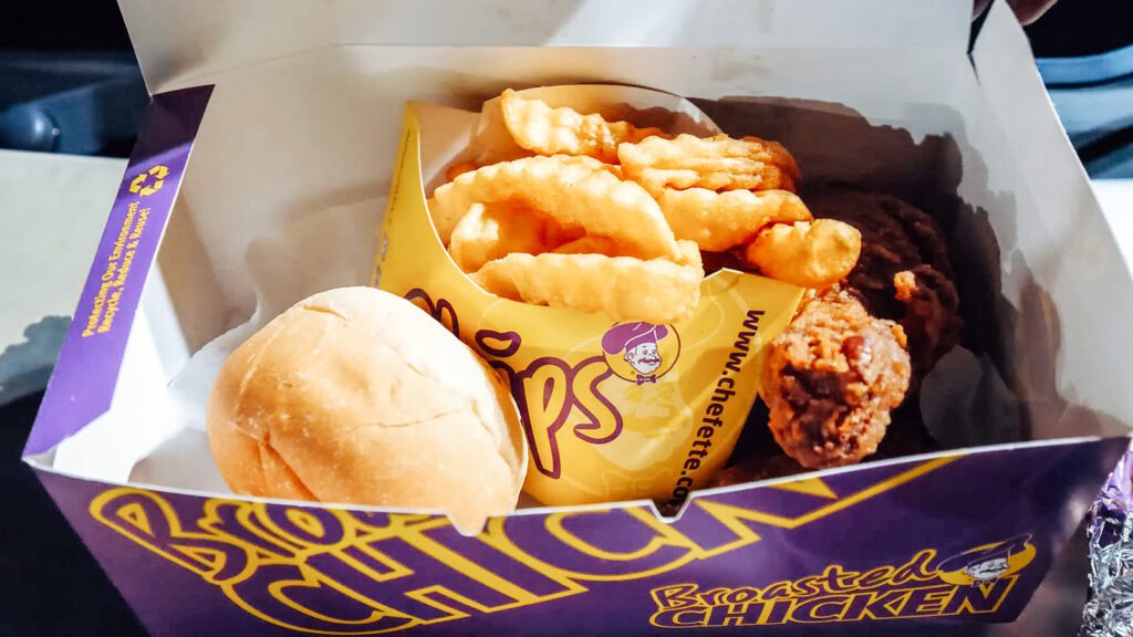 The snack box at Chefette, containing two pieces of fried chicken, French fries, and a roll | Davidsbeenhere