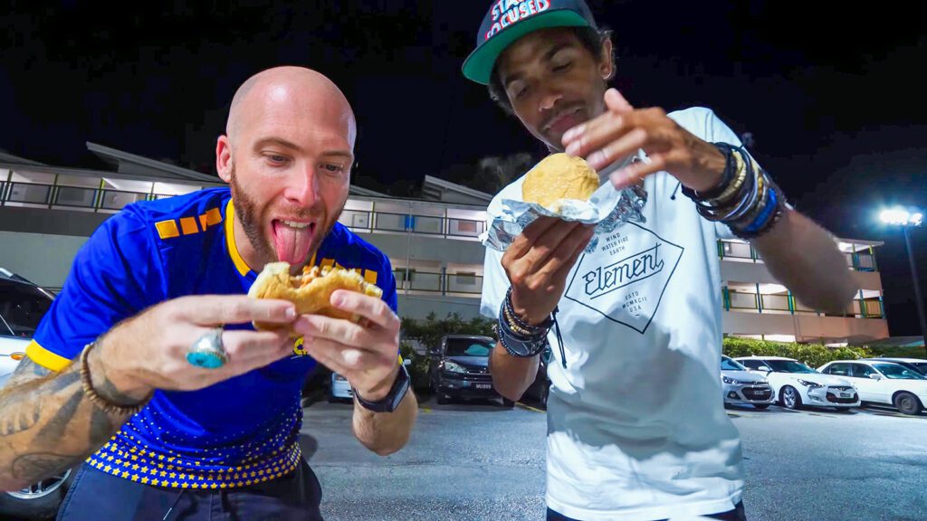 David Hoffmann and his guide Craig enjoying Chefette burgers in Barbados | Davidsbeenhere