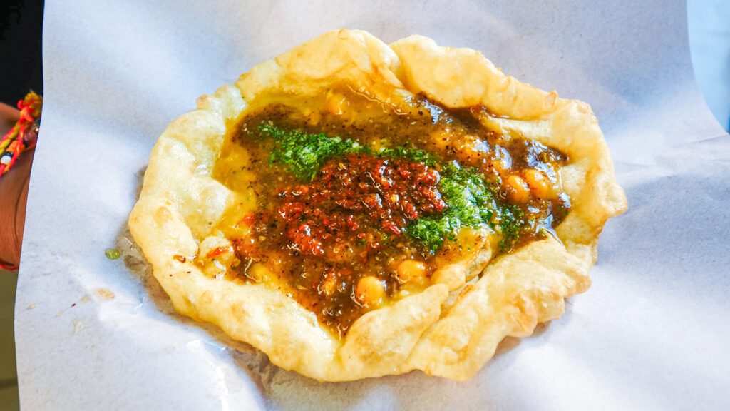 Doubles (fried flatbread topped with chana and chutneys), a popular Caribbean breakfast in Trinidad and Tobago | Davidsbeenhere
