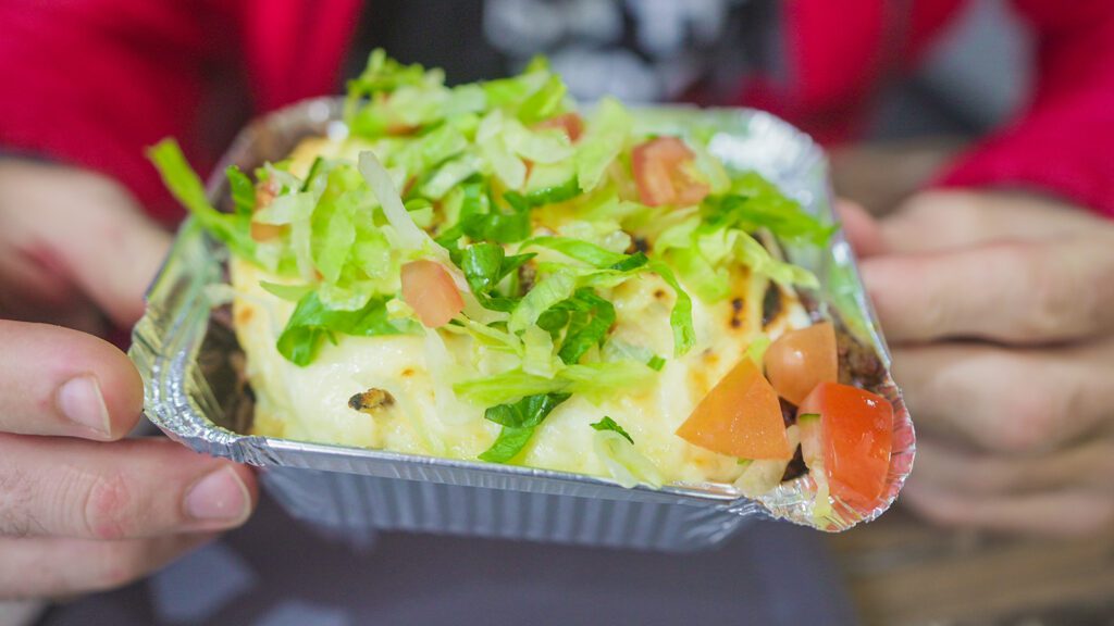 Kapsalon, a popular food in Rotterdam that blends Dutch, Turkish, and Indonesian ingredients | Davidsbeenhere