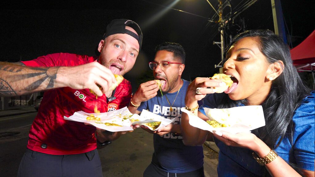 David Hoffmann, Chef Jason Peru, and Candice Mohan eat doubles from S&S Doubles at night | Davidsbeenhere