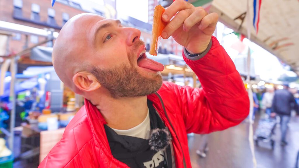 David Hoffmann lowers a piece of fresh smoked salmon into his mouth | Davidsbeenhere