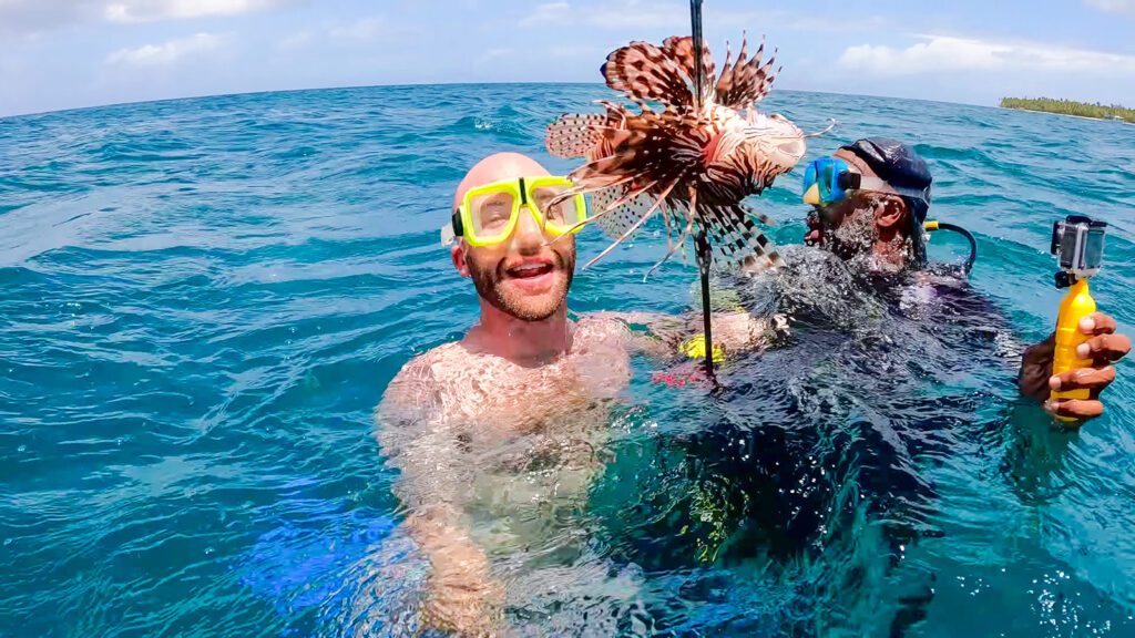 David Hoffmann shows off a lionfish he speared in the waters off the island of Tobago | Davidsbeenhere