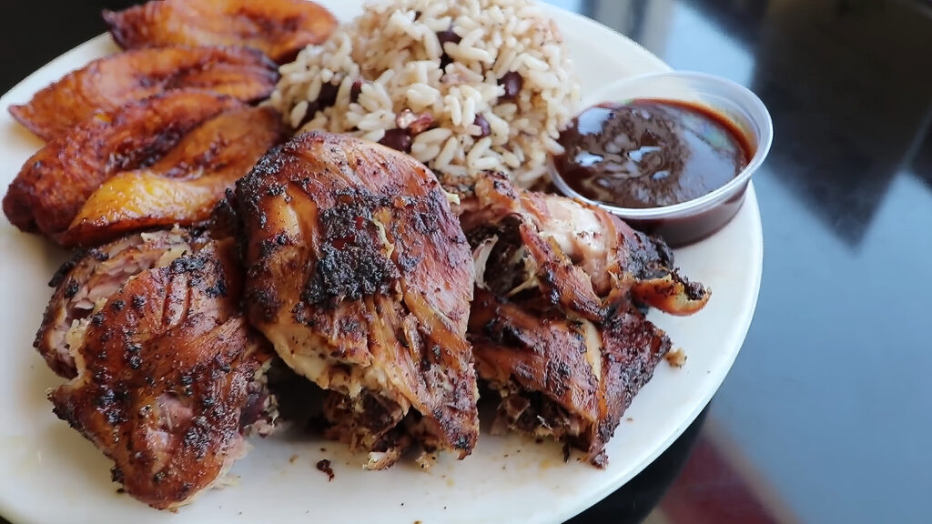 Jerk chicken is known for its sweet, smoky, spicy, and vibrant flavors and is one of the world's most popular Caribbean dishes | Davidsbeenhere