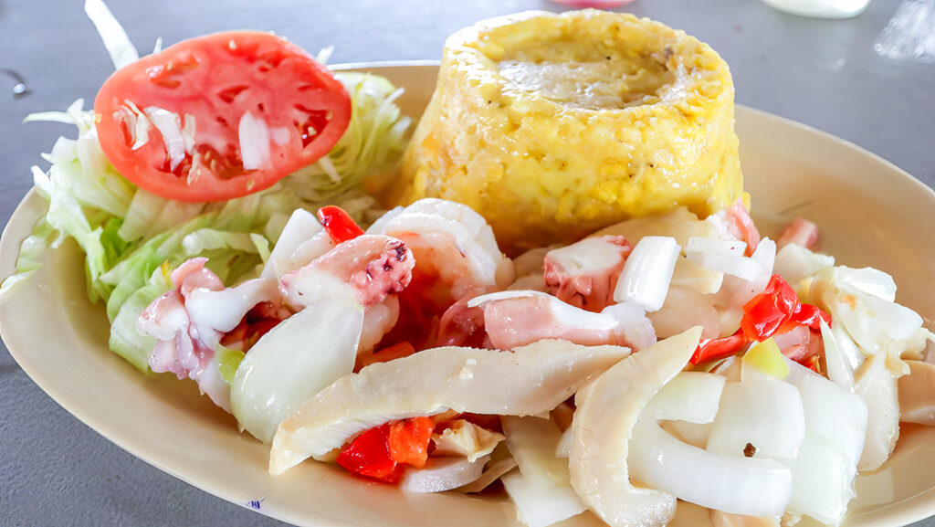 Mofongo with seafood ceviche and a salad in Puerto Rico | Davidsbeenhere