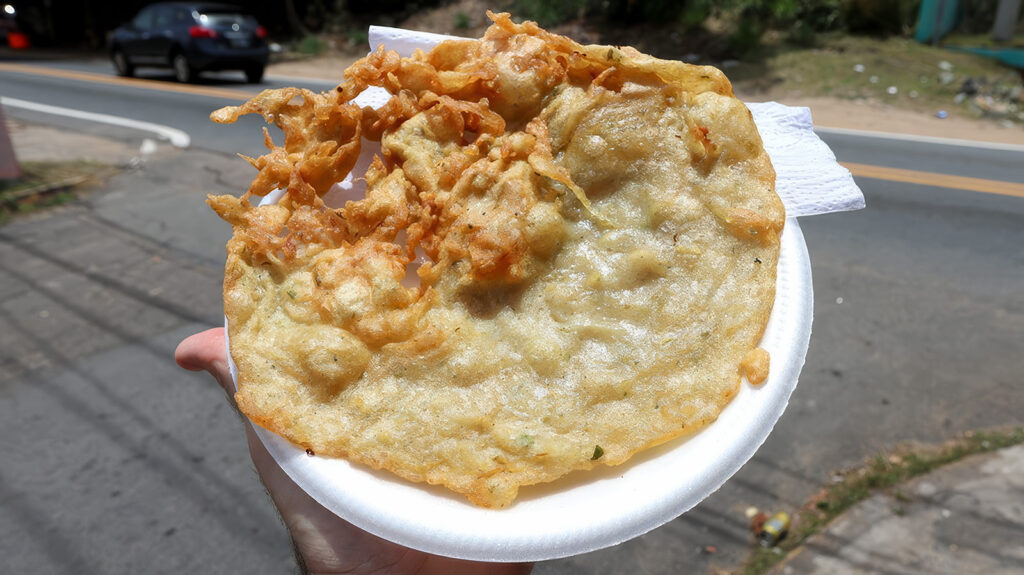 Bacalaito, a Puerto Rican fritter containing codfish, garlic, and cilantro | Davidsbeenhere