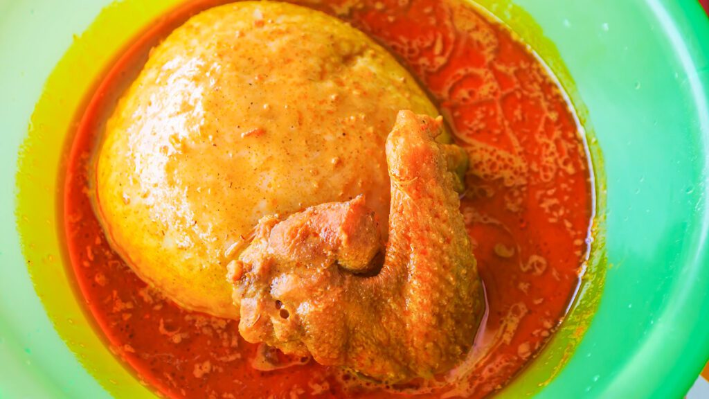 A bowl of fufu, chicken, and soup in Ghana | Davidsbeenhere