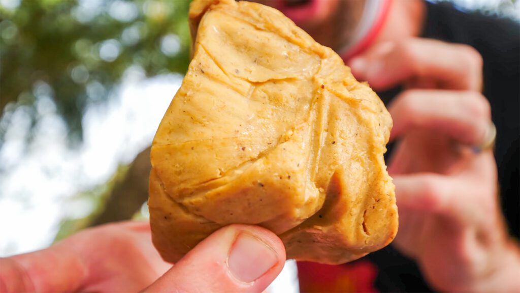 A ball of kenkey, a starchy, fermented dough made from cornmeal | Davidsbeenhere