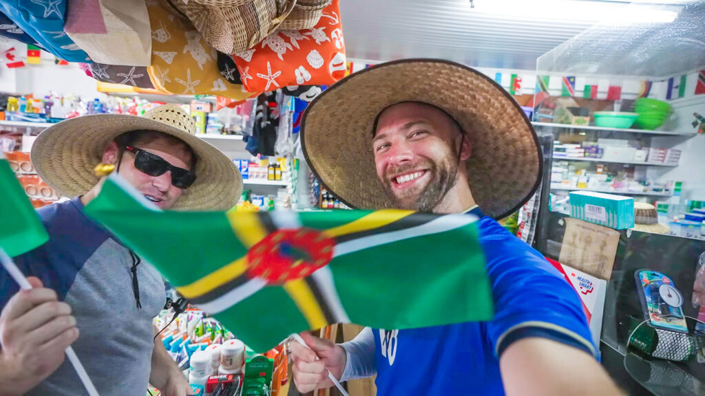 David Hoffmann and Nathan Plutzik wave Dominican flags in a convenience store in Portsmouth | Davidsbeenhere