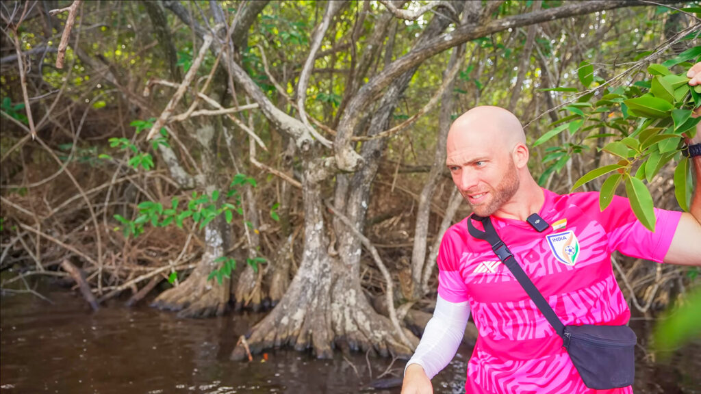 David Hoffmann searches for giant crabs in a swamp in Dominica | Davidsbeenhere