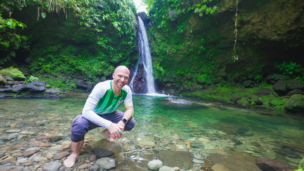 David Hoffmann poses in the pool below Jacko Falls in Dominica | Davidsbeenhere