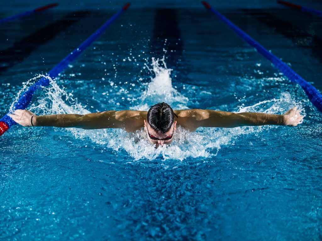 A swimmer competes in a race | Davidsbeenhere