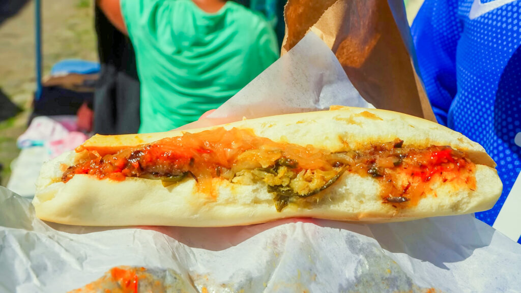 A long saltfish and smoked herring sandwich with pepper sauce in Roseau, Dominica | Davidsbeenhere